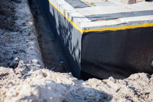 Professional Waterproofing technician working in Ridgeway, VA